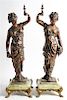 A Pair of Continental Cast Metal and Onyx Figures Height 28 inches.