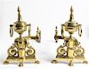 A Pair of Neoclassical Style Gilt Metal Andirons Height 12 1/2 x length 19 inches.