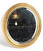An Oval Gilt Metal Mirror Height 15 x width 13 inches.