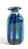An Iridescent Glass Bottle Height 3 1/2 inches.