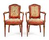A Pair of Louis XVI Style Fauteuils Height 37 1/4 inches.