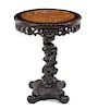 * A Chinese Carved Teak Table Height 29 x diameter of top 21 1/2 inches.