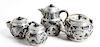 Four Chinese Pewter Mounted Yixing Pottery Tea Pots Height of tallest 6 1/8 inches.