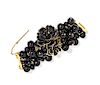 A Gianni Versace Black Bead and Floral Bracelet, 7" x 1.5".