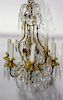 A Gilt Metal Six-Light Chandelier Height 28 inches.
