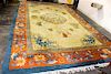 * A Chinese Wool Rug 17 feet 10 inches x 10 feet 10 inches.