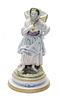 A Continental Bisque Porcelain Figure, Height 9 inches.