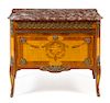 A Louis XVI Style Gilt Metal Mounted Parquetry Commode