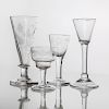 Three English Engraved Glass Stemware Pieces and a Plain Wine