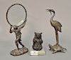 Group of three bronze items to include bronze figure hold magnifying glass bronze crane standing on a turtle back, ht