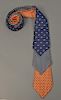 Assorted group of three Hermes silk ties, two with ducks and one with dolphins, #'s 5385OA, 5022PA, & 7964EA..