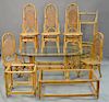 Large bamboo dining set to include glass top table, five chairs, bar, coffee table, and side table along with two piece wicker. tabl...
