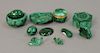 Malachite group to include a jewelry box, pill box, two carved snails, two eggs, two small dishes, horned animal, and two small poli...