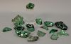 Fifteen carved malachite polished stones. wd. 1 3/4in. to 5in.