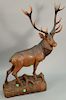 Large carved elk with antlers. ht. 32in., wd. 24in.