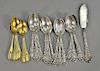 Nineteen piece lot to include Shreve & Low gilt decorated tea spoons, thirteen Medici by Gorham spoons, and butterknife