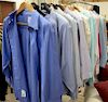 Rack of mens button down shirts including Polo, Brooks Brothers, Charret, Ferre, Alexander Julian, Vilebrequin, Delta Ciana, and San...