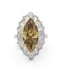 * A Platinum, Yellow Gold, Treated Fancy Dark Brown-Yellow Diamond and Diamond Ring, 9.10 dwts.