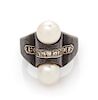 * An Art Moderne Blackened Steel, White Gold and Cultured Pearl Ring, Marsh & Co., 16.20 dwts.