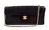 A Chanel Black Lambskin Chocolate Bar Flap Handbag, 10.5" x 5.5" x 1.5"; Strap drop: 12".
