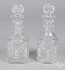 Two similar cut glass decanters