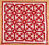 Red and white pieced quilt