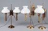 Three brass student lamps with milk glass shades