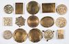 Group of brass trivets and plates.
