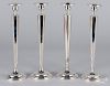 Set of four weighted sterling silver candlesticks