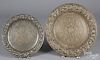 Two Italian embossed pewter chargers