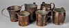 Six copper two-handled mugs