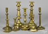 Eight brass candlesticks