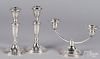 Three weighted sterling silver candlesticks