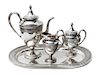 An American Silver Tea Set, International Silver Co., Meriden, CT, Wedgwood pattern, Height of first 11 3/4 inches.