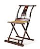 * A Chinese Elmwood Folding Chair, Jiaoyi Height 37 1/4 x width 22 1/2 x depth 27 inches.