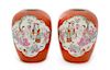 A Pair of Gilt Decorated Coral Red Ground Famille Rose Porcelain Jars Height 11 1/4 inches.