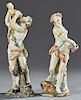 Two Polychromed Porcelain Figures, late 19th c., of Pan with a wine skin, on an integral base with a tree trunk and a basket of grapes; and a nude wom