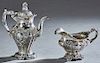 Two Pieces of Sterling, consisting of a teapot, #596, by Gorham in the "Chantilly-Grand" pattern, Wt.- 28.6 Troy Oz. H.- 10 1/2 in., W.- 9 1/4 in., D.