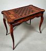 French Louis XVI Style Inlaid Mahogany Games Table, 19th c. the inlaid dished cookie corner top with a central chess board, reversing to a baize lined
