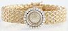 Lady's 14K Yellow Gold Adler Manual Wind Wristwatch, c. 1960, with a diamond mounted bezel and a gold mesh band, purchased from Adler's, New Orleans, 