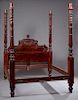 Carved Santo Domingo Mahogany Tester Bed, mid 19th c., the headboard with an urn crest over relief carved scrolls, carved on the front and back, with 