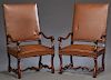 Pair of Louis XIII Style Carved Walnut Fauteuils a la Reine, early 20th c., the rectangular back over curved arms and trapezoidal seats on cabriole le