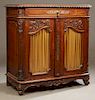 French Louis XV Style Carved Walnut Sideboard, 19th c. the rectangular rounded corner gadroon edge top over a long frieze drawer, above double arched 