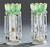 Pair of American Frosted Glass Lusters, 19th c., the green floriform gilt decorated glass shades hung with long button and spear cut glass prisms on a