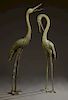 Pair of Patinated Bronze Crane Fountain Figures, 20th c., with relief details, Taller- 68 1/2 in., W.- 27 in., D.- 25 in.