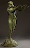 Patinated Bronze Fountain Figure, 20th c., in the form of a nude woman holding a large shell, on a relief decorated stepped circular base, H.- 61 1/2 
