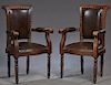 Pair of French Carved Walnut and Leather Fauteuils, c. 1900, the scrolled upholstered back to scrolled upholstered arms and bowed seats, on turned tap