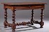 French Provincial Carved Walnut Writing Table, 18th c., the stepped edge rectangular top over a long frieze drawer on rope twist legs with turned and 
