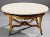 French Louis XV Style Gilt and Gesso Marble Top Coffee Table, 20th c., the circular white figured marble on a base with a floral carved skirt, to four