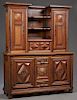 French Provincial Louis XIII Style Carved Oak Sideboard, early 20th c., the breakfront upper section with three center shelves over double cupboard do